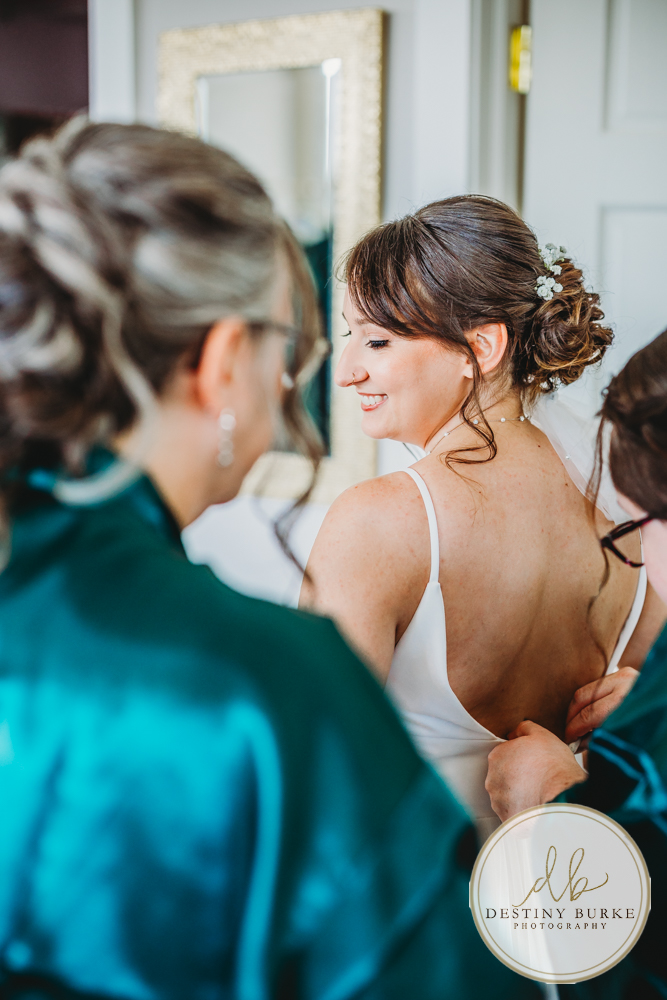 Elegant ballroom wedding at Ballroom at Carey Lake, captured by one of the best wedding photographers near Rochester, NY, featuring timeless portraits, refined details, and a joyful celebration.