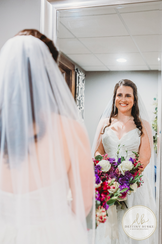 Couple's wedding day portraits from the best wedding photographer near Rochester, Brockport, NY Golf Course Venue Deerfield Country Club, purple themed marriage.