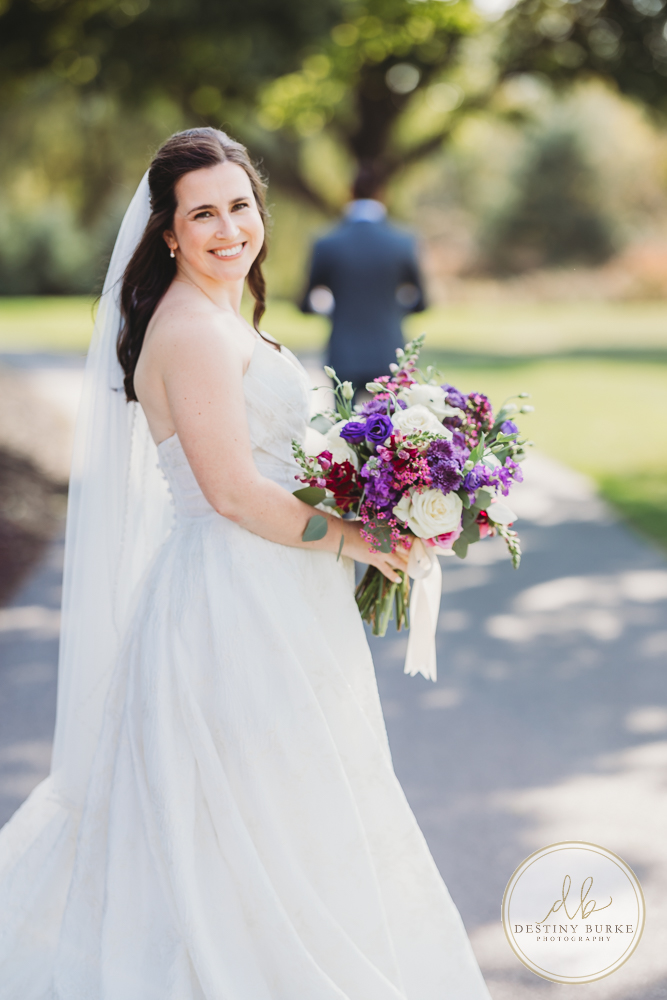 Couple's wedding day portraits from the best wedding photographer near Rochester, Brockport, NY Golf Course Venue Deerfield Country Club, purple themed marriage.