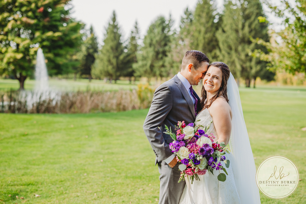 Couple's wedding day portraits from the best wedding photographer near Rochester, Brockport, NY Golf Course Venue Deerfield Country Club, purple themed marriage.