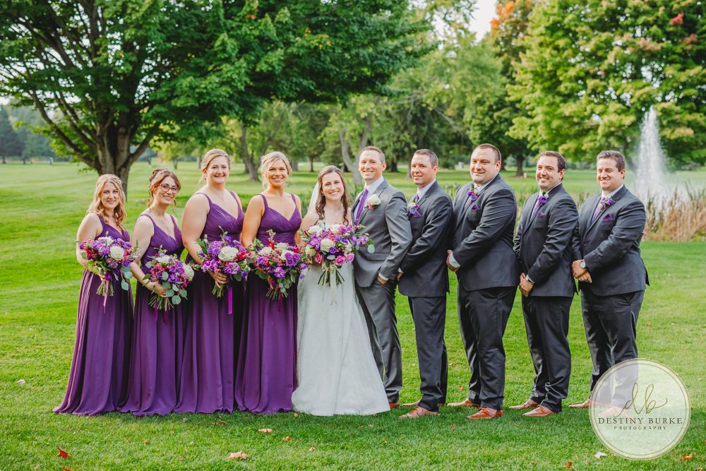 Couple's wedding day portraits from the best wedding photographer near Rochester, Brockport, NY Golf Course Venue Deerfield Country Club, purple themed marriage.