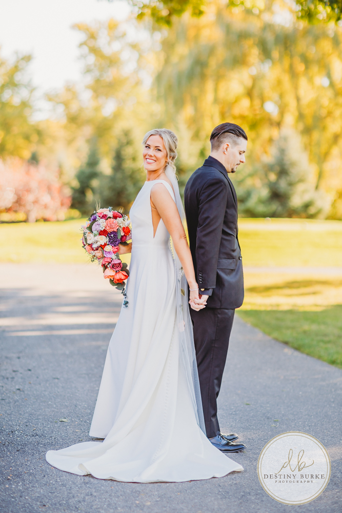 Couple's wedding day portraits from the best wedding photographer near Rochester, Brockport, NY Golf Course Venue Deerfield Country Club, fall themed marriage.