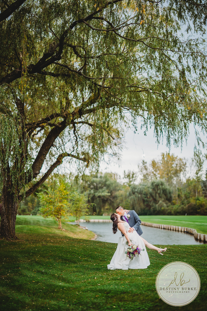 Couple's wedding day portraits from the best wedding photographer near Rochester, Brockport, NY Golf Course Venue Deerfield Country Club, purple themed marriage.