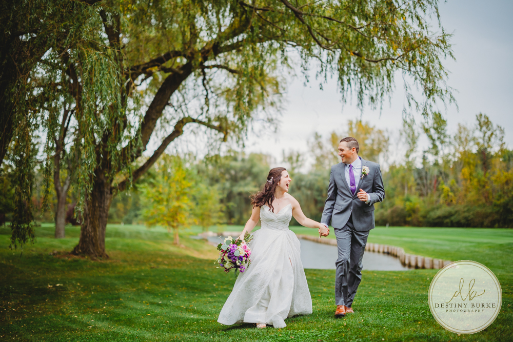 Couple's wedding day portraits from the best wedding photographer near Rochester, Brockport, NY Golf Course Venue Deerfield Country Club, purple themed marriage.