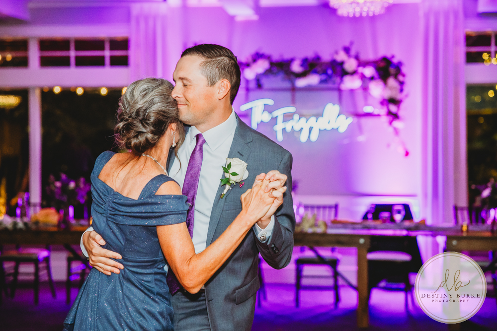 Couple's wedding day portraits from the best wedding photographer near Rochester, Brockport, NY Golf Course Venue Deerfield Country Club, purple themed marriage.