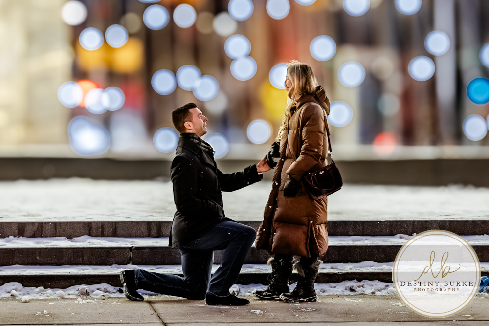 Premium proposal photography in Rochester, NY for couples seeking a high-end, personalized engagement experience in a beautiful winter city setting.