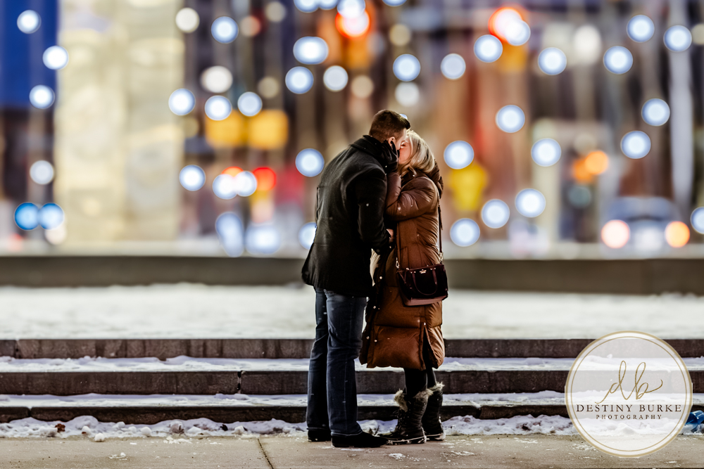 Premium proposal photography in Rochester, NY for couples seeking a high-end, personalized engagement experience in a beautiful winter city setting.
