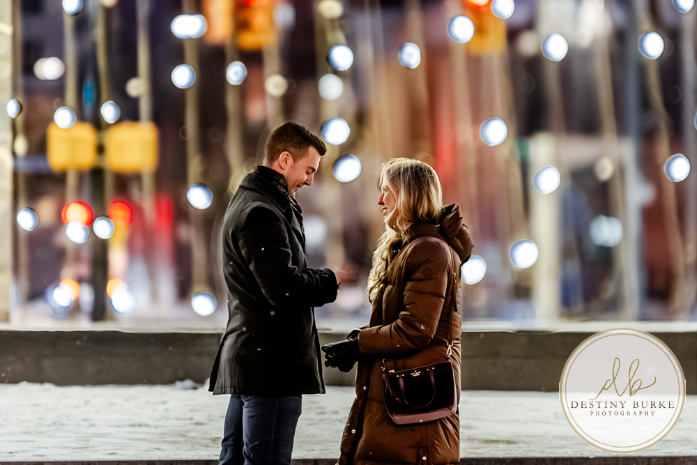 Premium proposal photography in Rochester, NY for couples seeking a high-end, personalized engagement experience in a beautiful winter city setting.