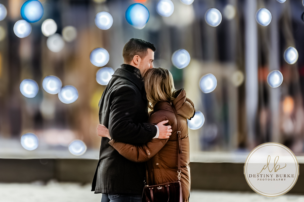 Premium proposal photography in Rochester, NY for couples seeking a high-end, personalized engagement experience in a beautiful winter city setting.