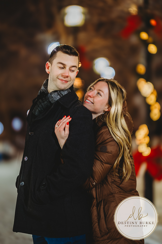 Epic Discreetly photographed surprise proposal at the Liberty Pole in Rochester, NY designed for clients seeking a seamless, stress-free luxury engagement experience.