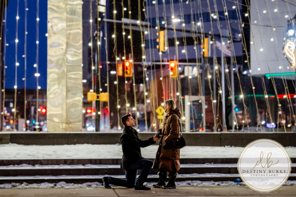 Premium proposal photography in Rochester, NY for couples seeking a high-end, personalized engagement experience in a beautiful winter city setting.