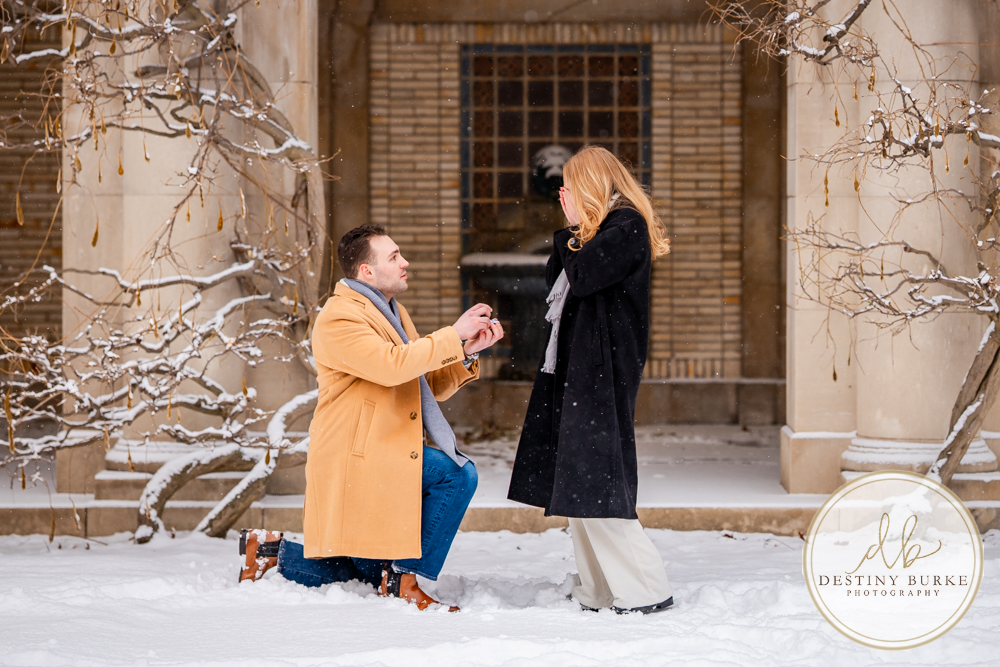 Emotional reaction during surprise proposal at George Eastman Museum in Rochester NY
