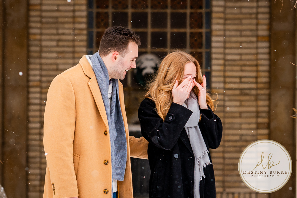 Emotional reaction during surprise proposal at George Eastman Museum in Rochester NY