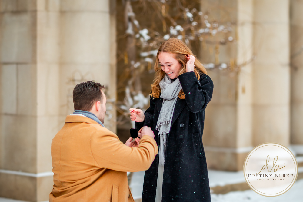 Emotional reaction during surprise proposal at George Eastman Museum in Rochester NY