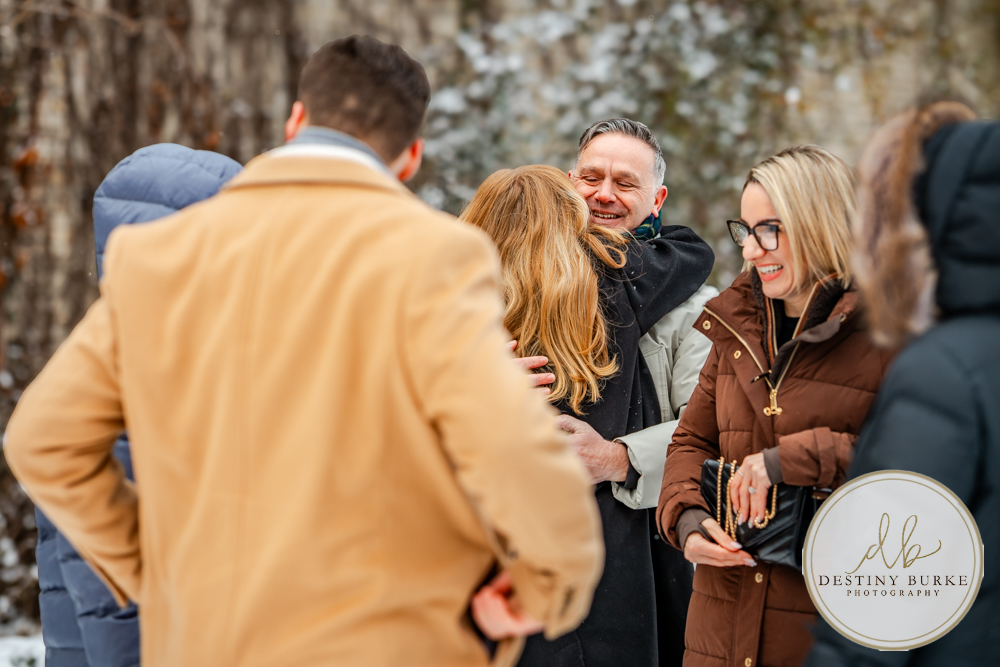 Emotional reaction during surprise proposal at George Eastman Museum in Rochester NY