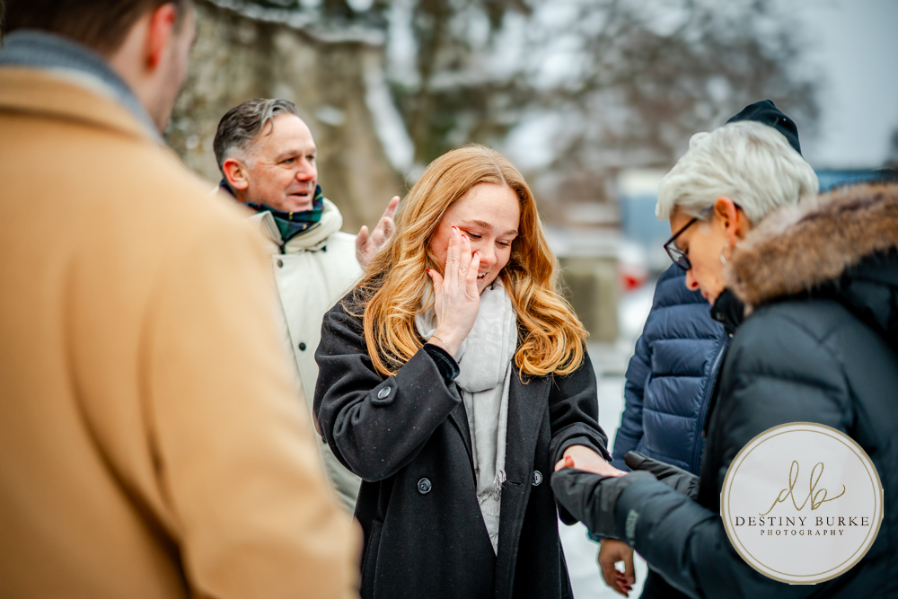 Emotional reaction during surprise proposal at George Eastman Museum in Rochester NY