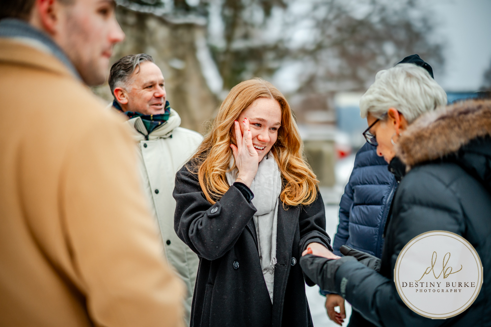 Emotional reaction during surprise proposal at George Eastman Museum in Rochester NY