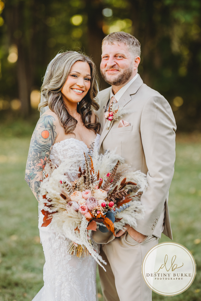Outdoor wedding ceremony with family and friends in Rochester NY backyard sunset portraits