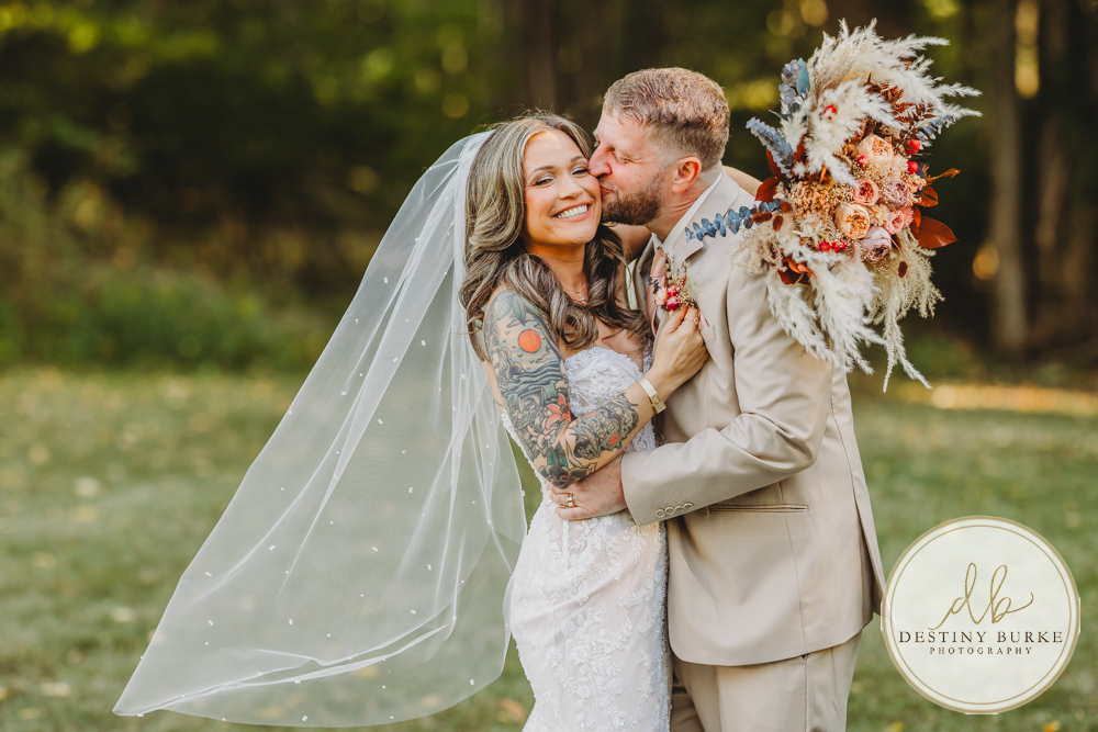 Outdoor wedding ceremony with family and friends in Rochester NY backyard sunset portraits