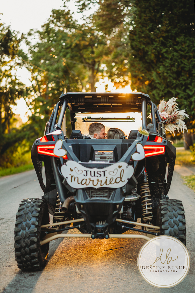 Outdoor wedding ceremony with family and friends in Rochester NY backyard sunset portraits