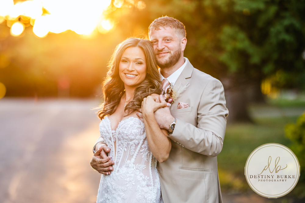 Outdoor wedding ceremony with family and friends in Rochester NY backyard sunset portraits