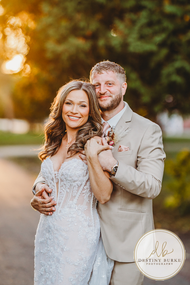Outdoor wedding ceremony with family and friends in Rochester NY backyard sunset portraits