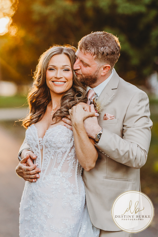 Outdoor wedding ceremony with family and friends in Rochester NY backyard sunset portraits