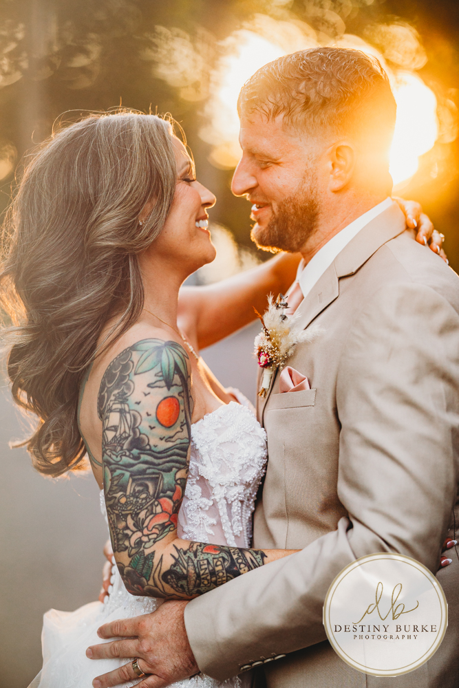 Outdoor wedding ceremony with family and friends in Rochester NY backyard sunset portraits