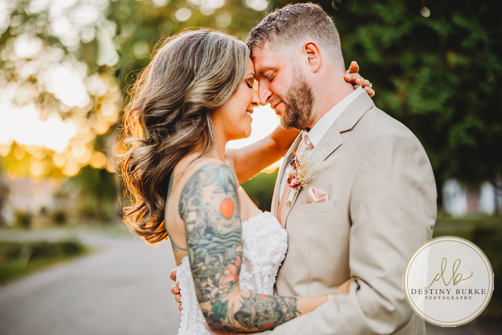 Outdoor wedding ceremony with family and friends in Rochester NY backyard sunset portraits