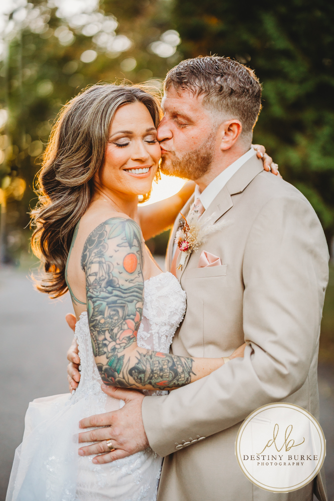 Outdoor wedding ceremony with family and friends in Rochester NY backyard sunset portraits