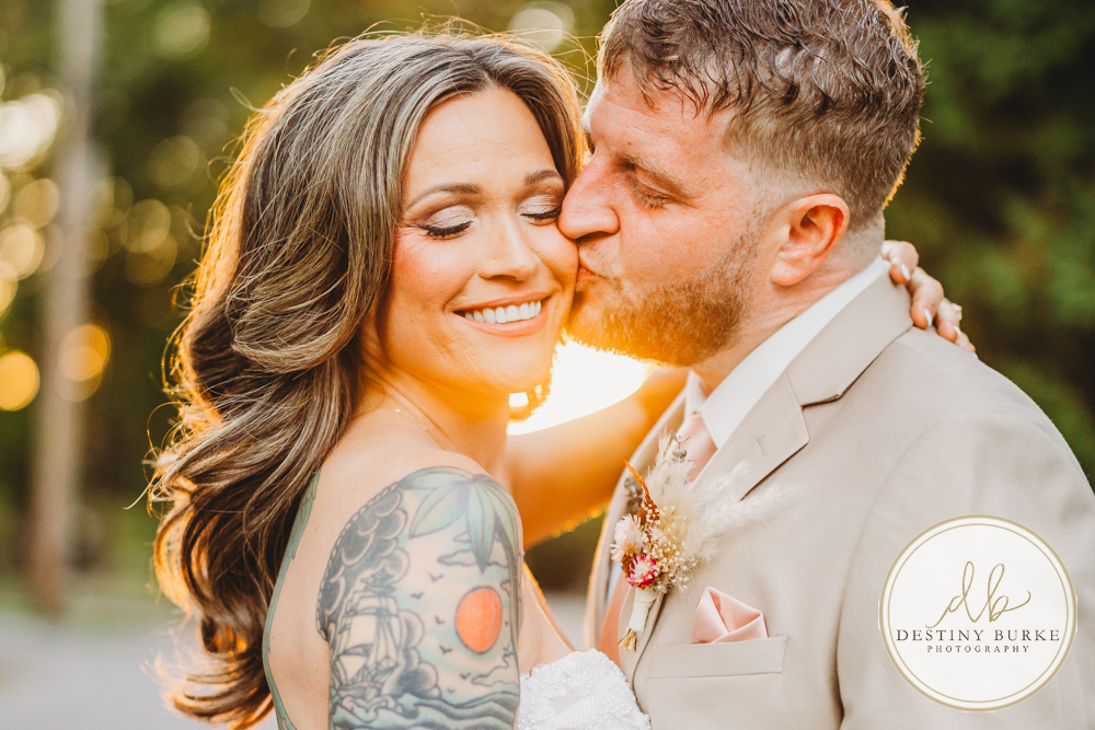 Outdoor wedding ceremony with family and friends in Rochester NY backyard sunset portraits