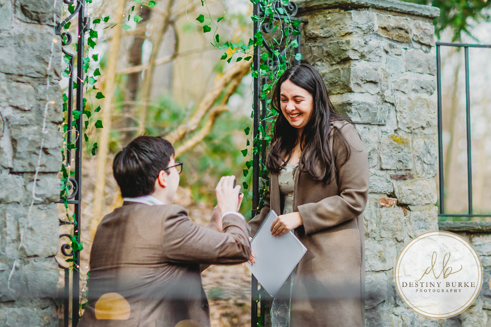 Engagement photos at Sunken Gardens Rochester NY golden hour romantic portraits Proposal photographer capturing candid engagement moment in Rochester NY