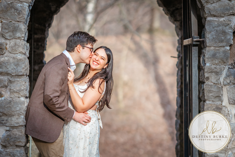 Engagement photos at Sunken Gardens Rochester NY golden hour romantic portraits Proposal photographer capturing candid engagement moment in Rochester NY
