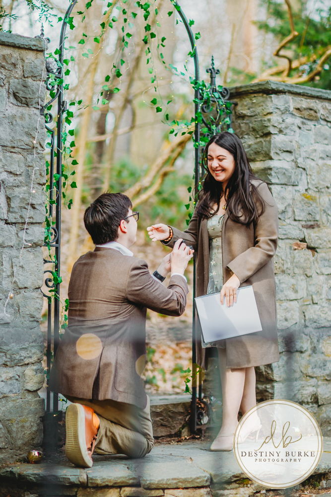 Engagement photos at Sunken Gardens Rochester NY golden hour romantic portraits Proposal photographer capturing candid engagement moment in Rochester NY